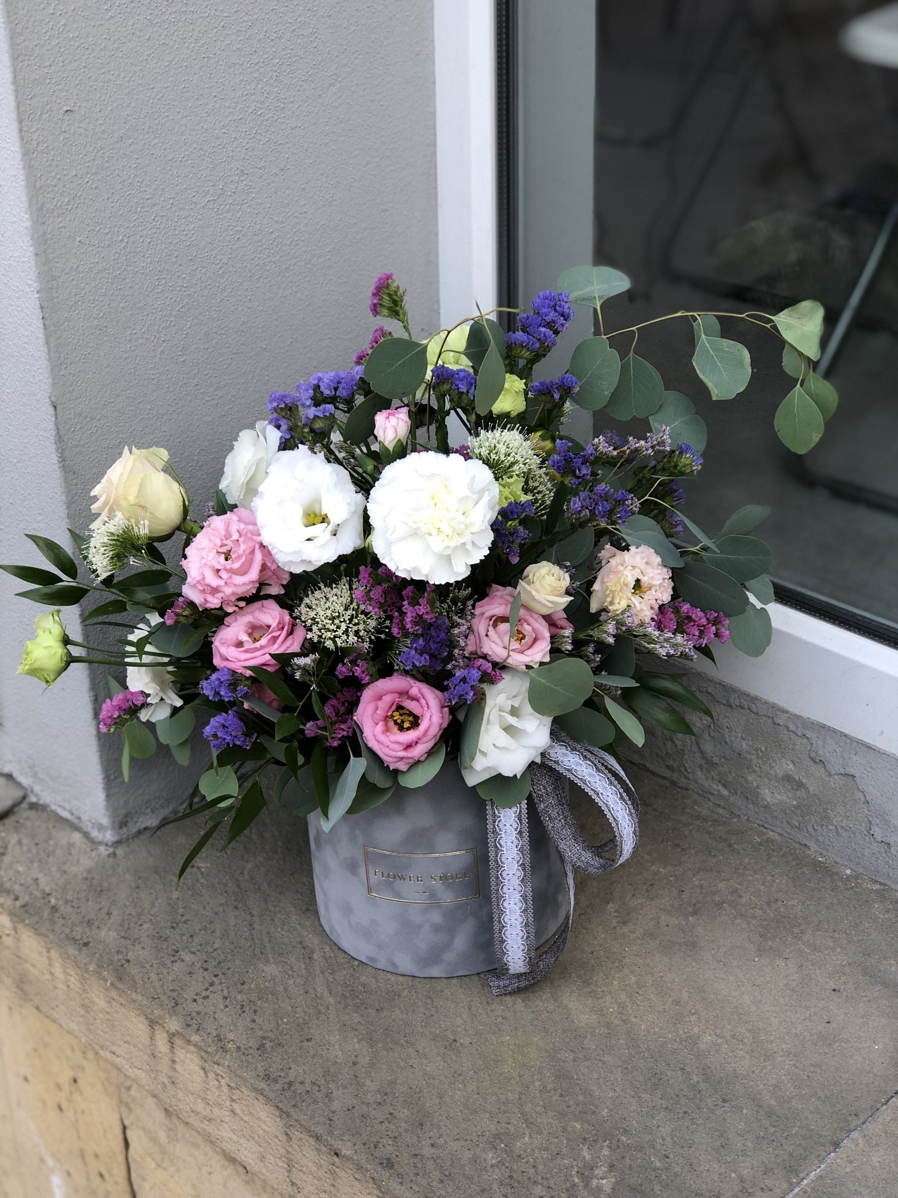 Airy composition of gray flocked flowerbox - live flowers