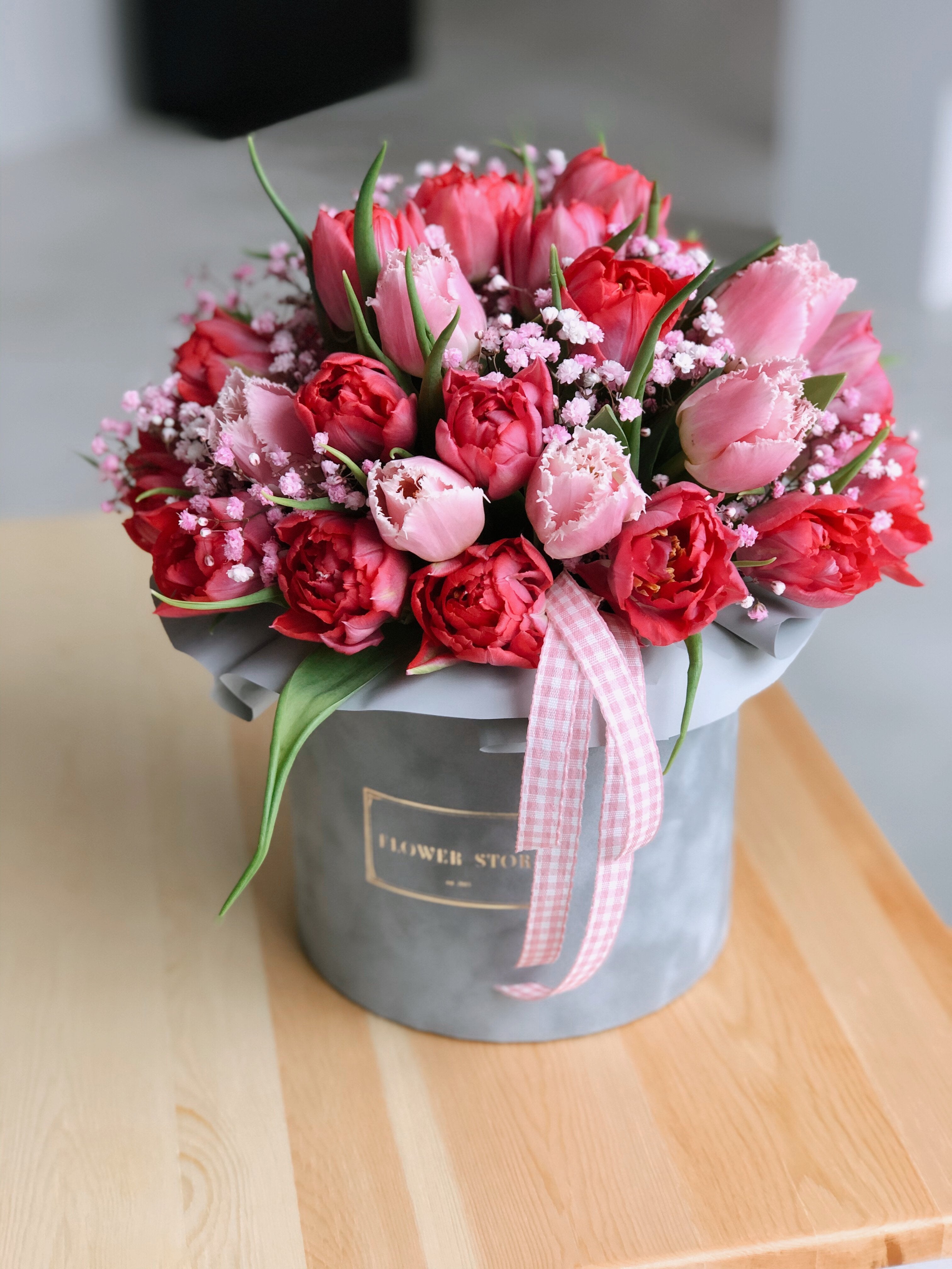 Gray flocked flowerbox with tulips