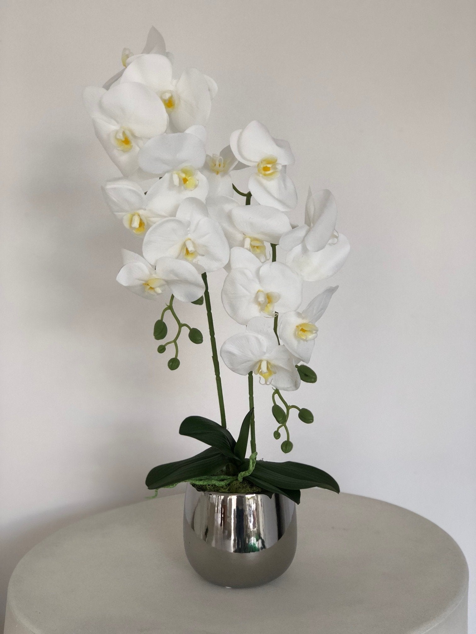 Exclusive small orchid in a silver pot- artificial flowers