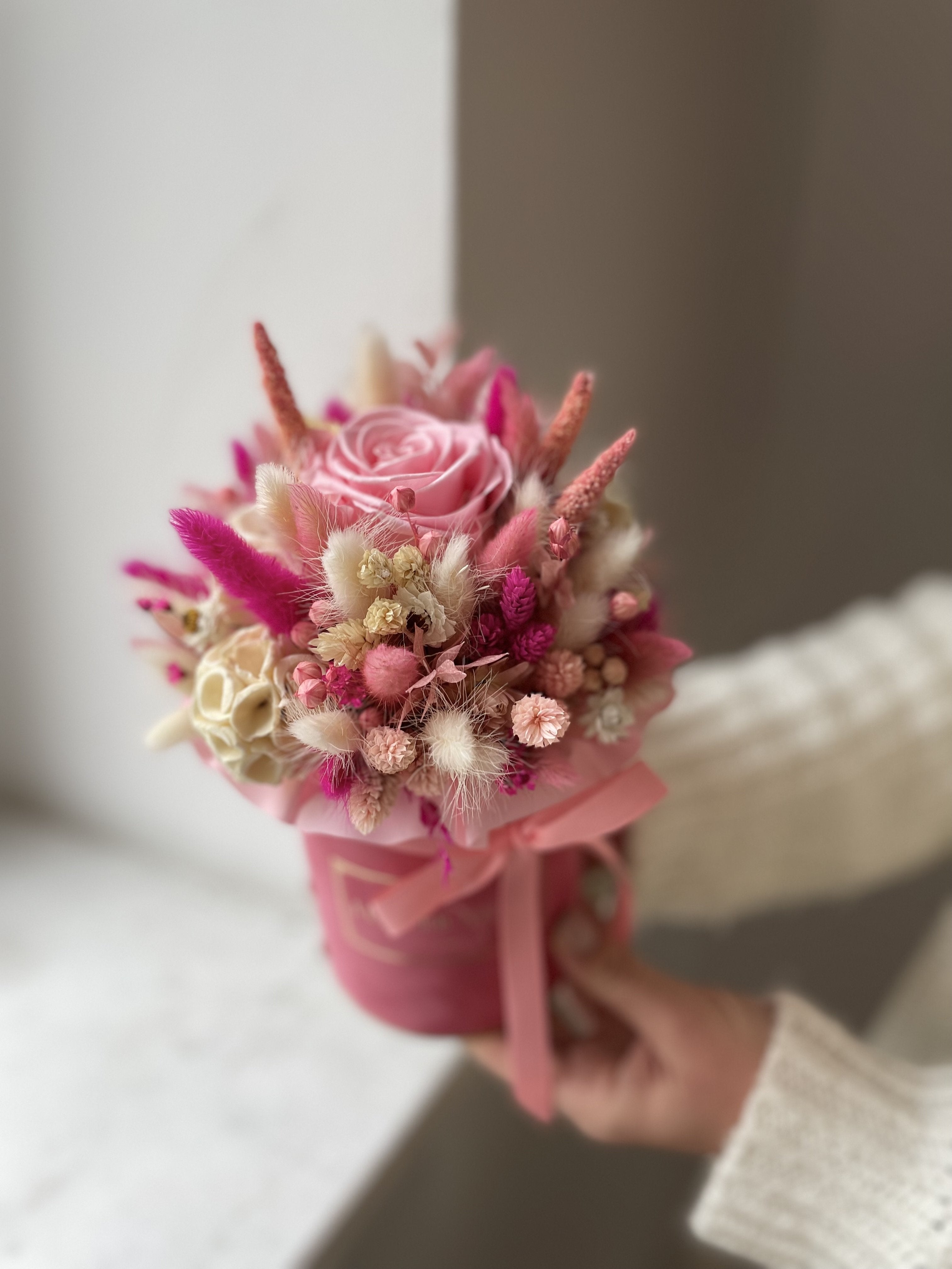 Small flocked dried flower box with a pink eternal rose